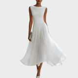 Lara – Elegantna Plisirana Obleka